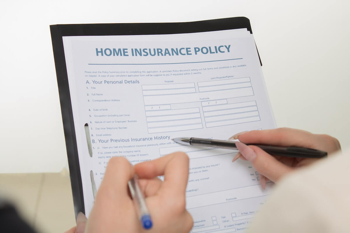 reviewing and signing a home insurance policy